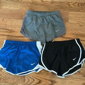 Three pairs Nike dri-fit shorts size small - blue, black, gray